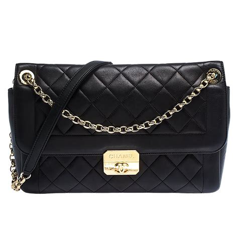 chanel 1980's pin clasp flap bag|More.